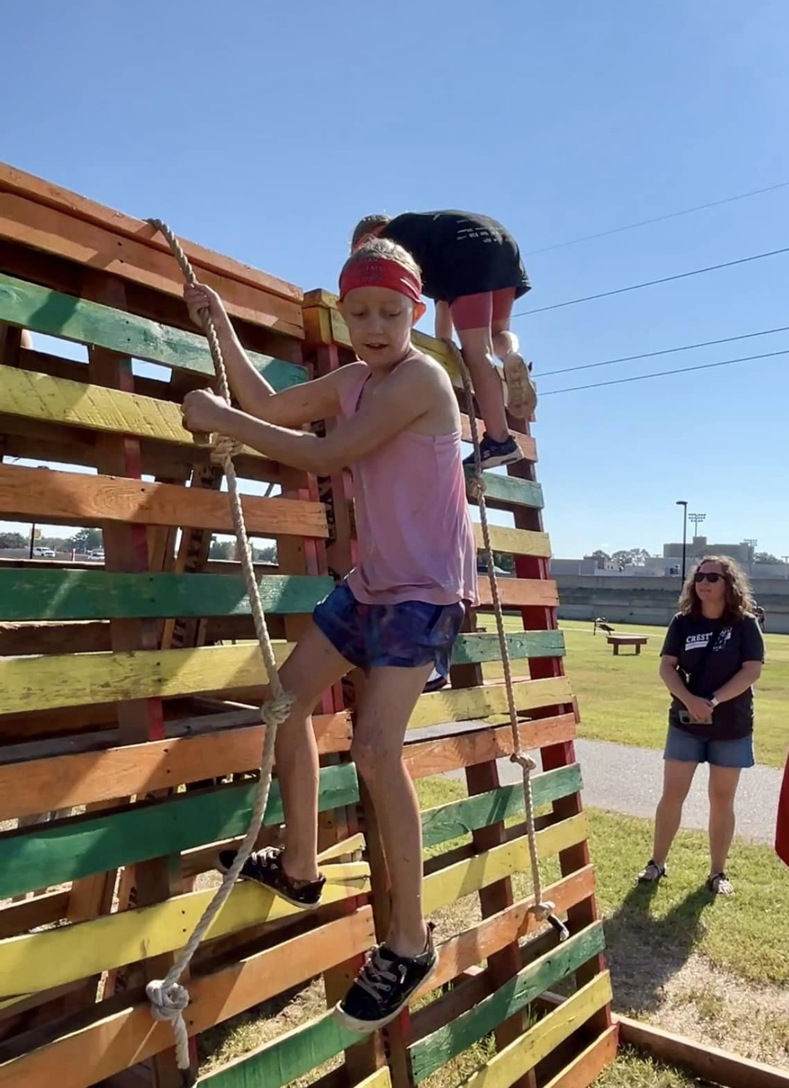 Kid climbing wall