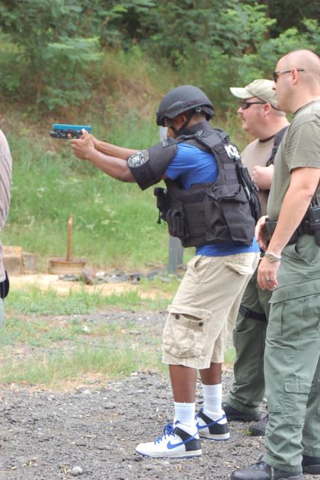 Child shooting a gun